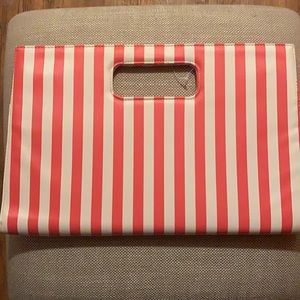 Coral and white stripe clutch.Never worn